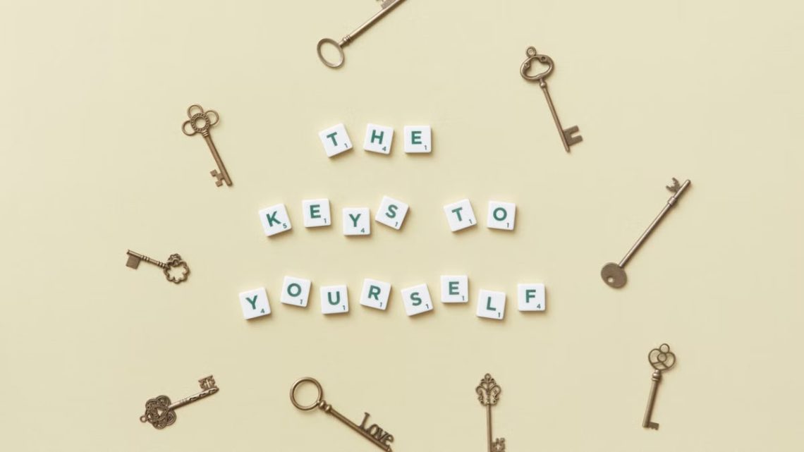 Motivational message with antique keys and letter blocks on yellow background.