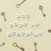 Motivational message with antique keys and letter blocks on yellow background.